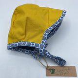 Size 0-3m: Handmade Hazel Locally Made Reversible Bonnet w/Sun Brim - Yellow w/Pattern Trim
