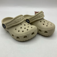 Size 5: Crocs Creme Adjustable Strap Shoes