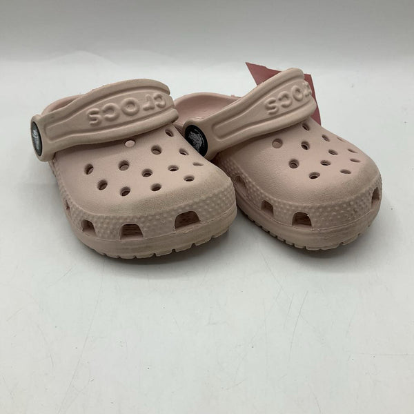 Size 4: Crocs Faded Pink Adjustable Strap Shoes