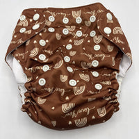 Size O/S: Mama Koala Brown Rainbows Print Adjustable Snap Diaper