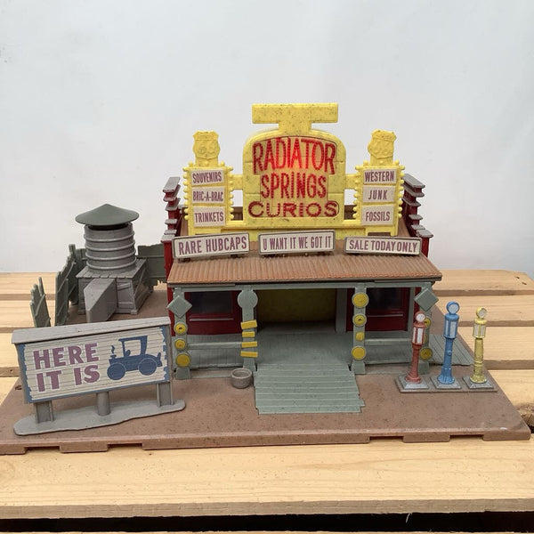 Collectors Corner Disney Cars Lizzie's Curios of Curiosity Playset