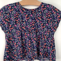 Size 4: Uniqlo Navy Floral Cap Sleeve Shirt