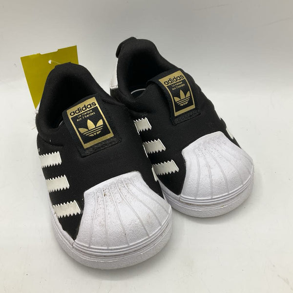 Size 4: Adidas Black/White Slip On Shoes