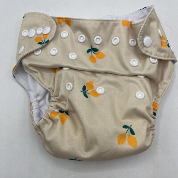 Size O/S: Nora's Nursery Creme Lemon Print Adjustable Snap Diaper