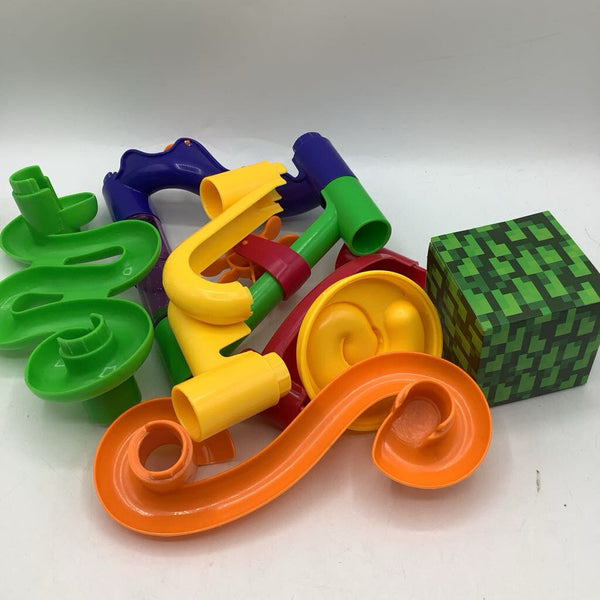 Green Container Of Assorted Plastic Marble Run