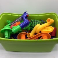Green Container Of Assorted Plastic Marble Run