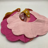 Size 0-12m: 6 Solid Color Bibs