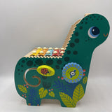 Manhattan Toys Wooden Musical Dino