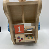 Manhattan Toys Wooden Musical Dino